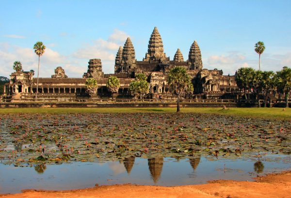 Angkor Wat temple towers reflected in the moat at sunrise, Siem Reap