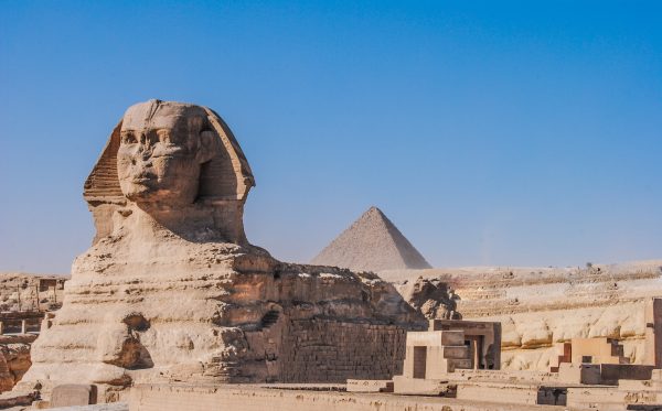 The Great Sphinx with the Pyramids of Giza behind it
