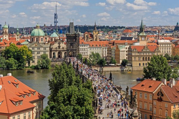 The statues of Charles Bridge over the Vltava river in Prague The statues of Charles Bridge over the Vltava river in Prague