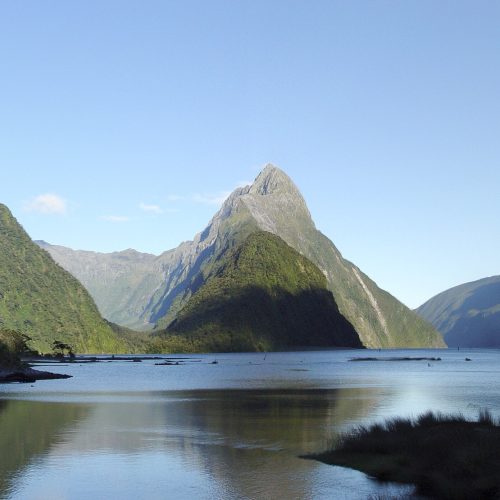 Mitre Peak rising above the water of Milford Sound, New Zealand
