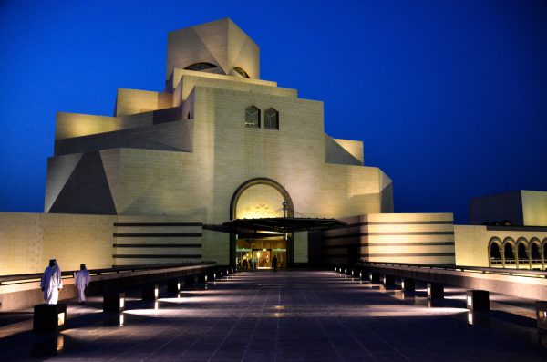 The Museum of Islamic Art beside the Doha waterfront skyline